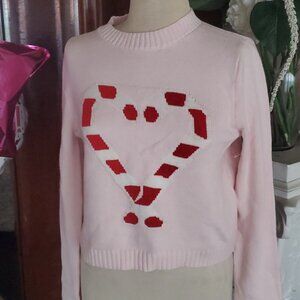 Pink sweater with hearts